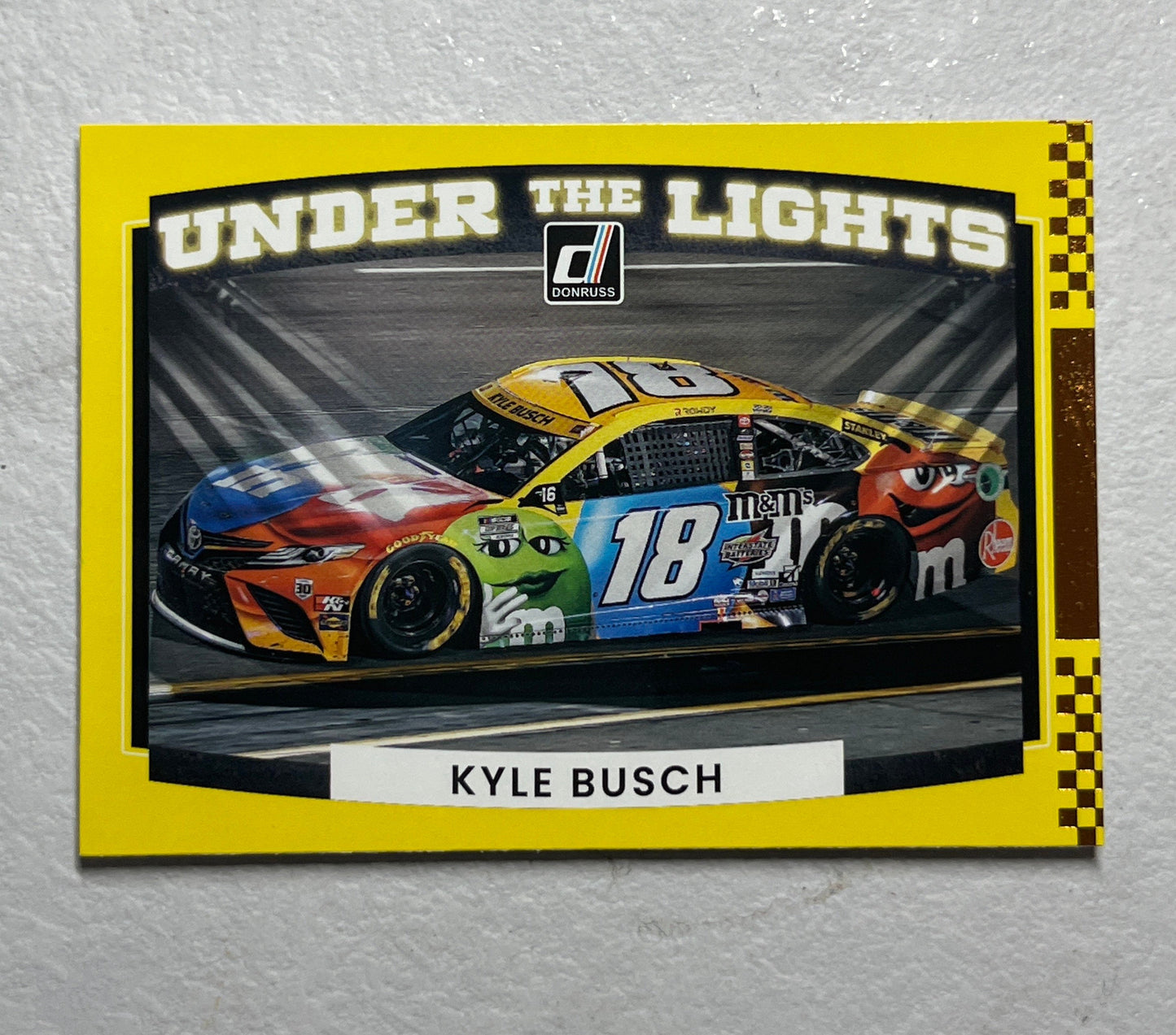 Kyle Busch - 2022 Donruss Racing NASCAR Under the Lights bronze paper insert card