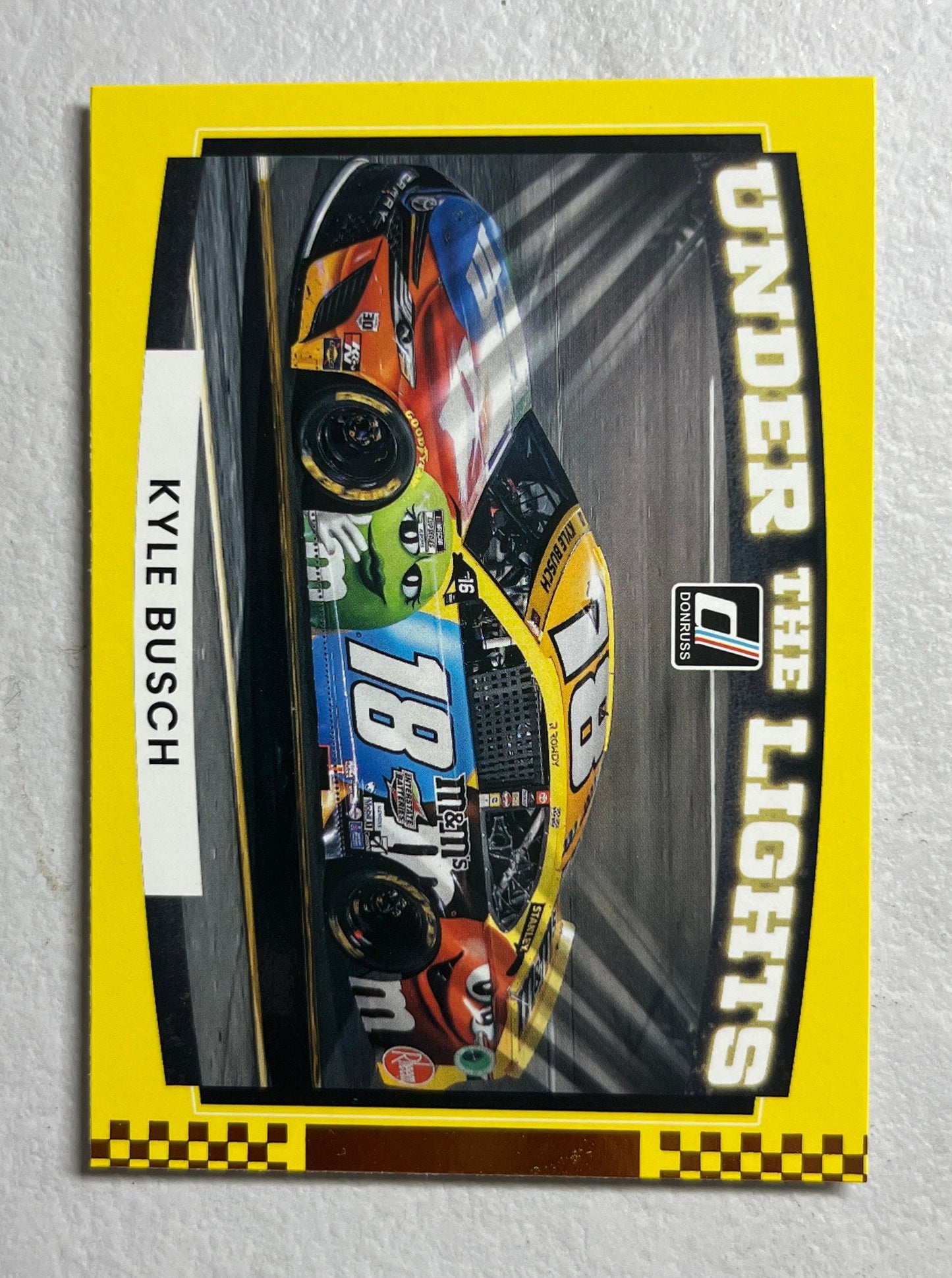 Kyle Busch - 2022 Donruss Racing NASCAR Under the Lights bronze paper insert card