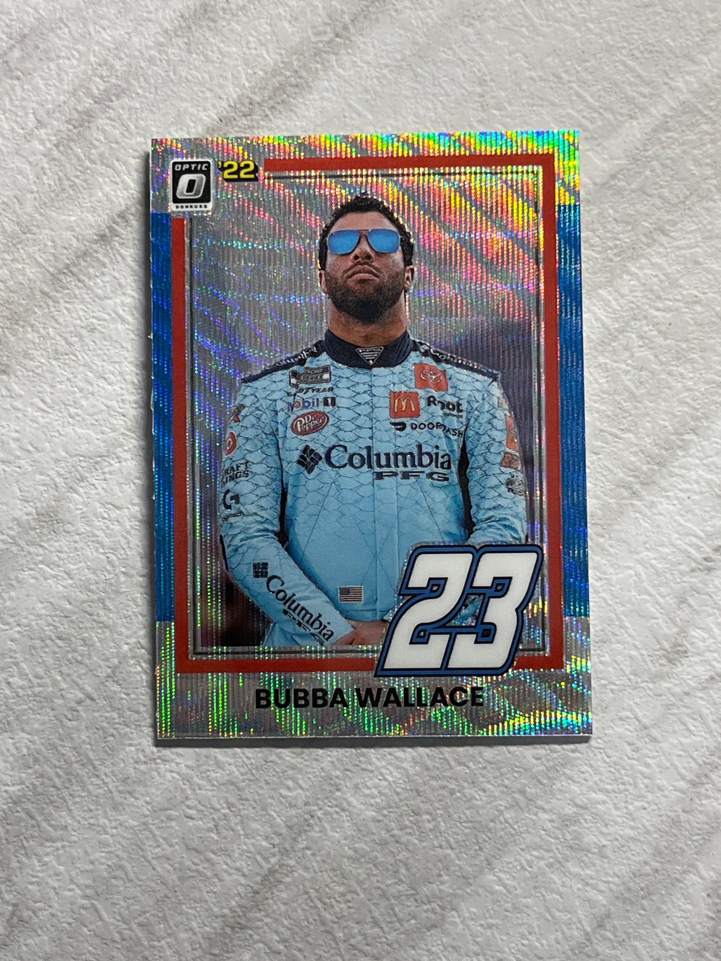 Bubba Wallace - 2022 Donruss Racing CAROLINA BLUE Optic Pulsar PRIZM 1981 Retro Variation card - short print