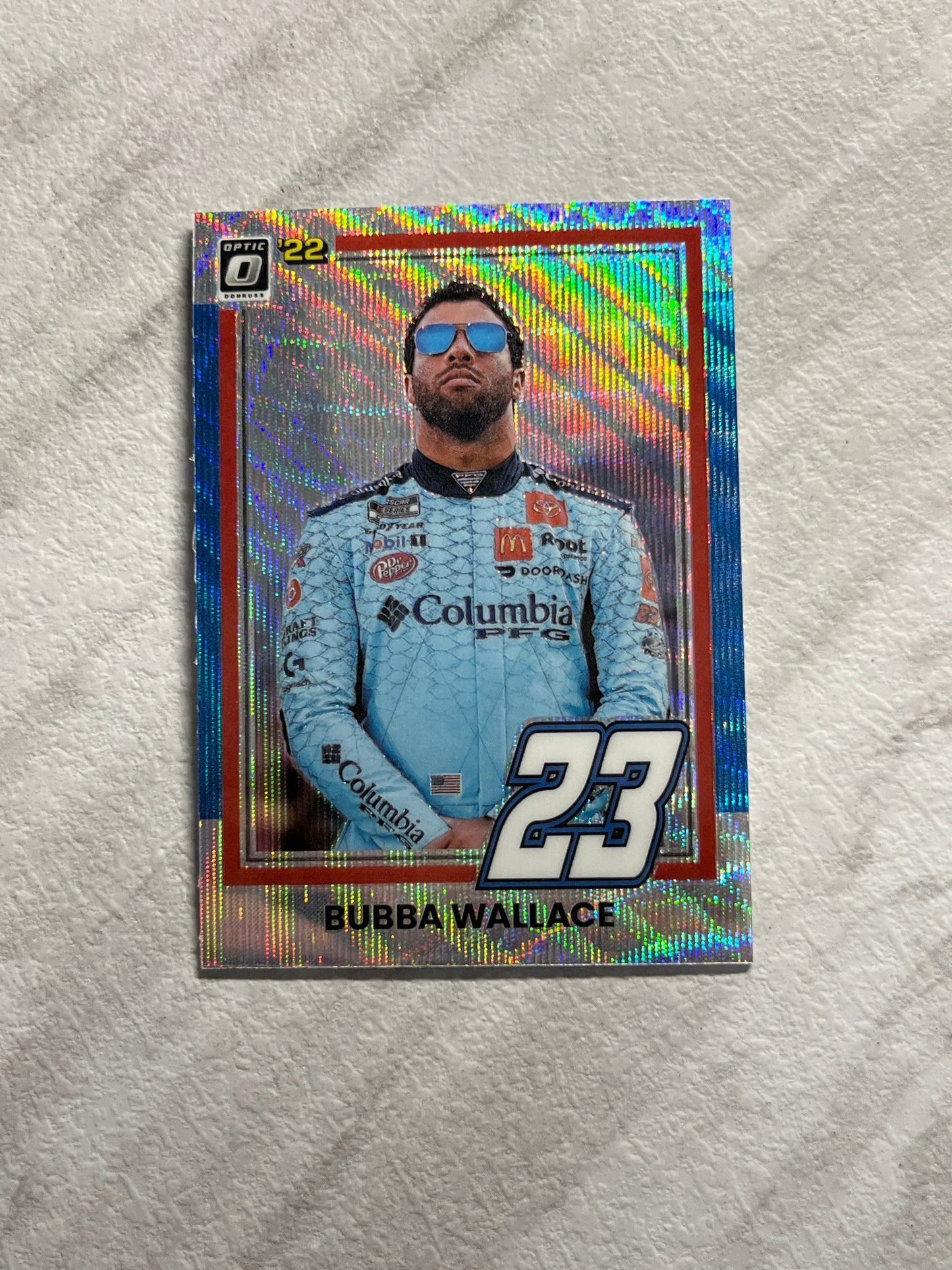 Bubba Wallace - 2022 Donruss Racing CAROLINA BLUE Optic Pulsar PRIZM 1981 Retro Variation card - short print