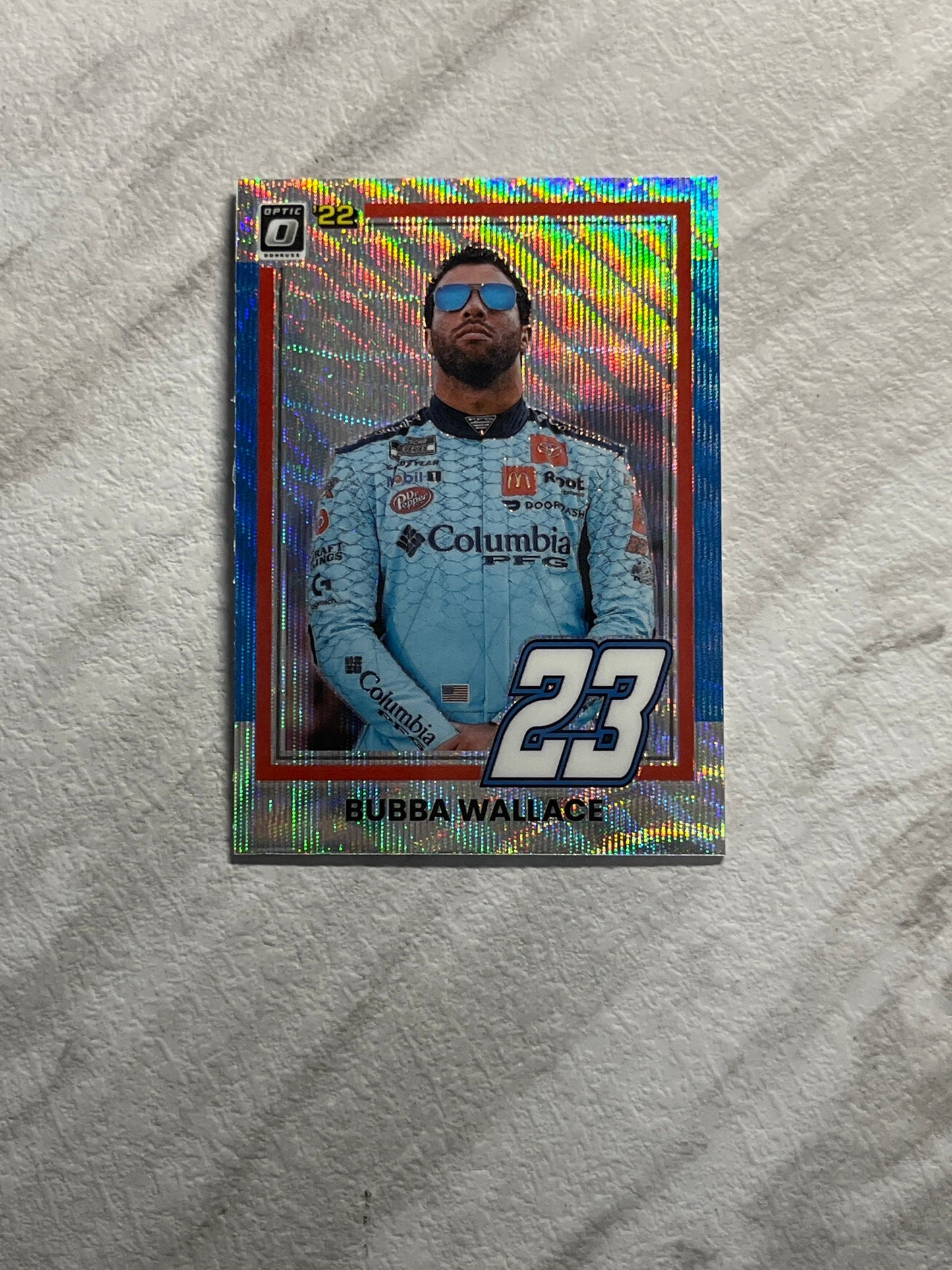 Bubba Wallace - 2022 Donruss Racing CAROLINA BLUE Optic Pulsar PRIZM 1981 Retro Variation card - short print