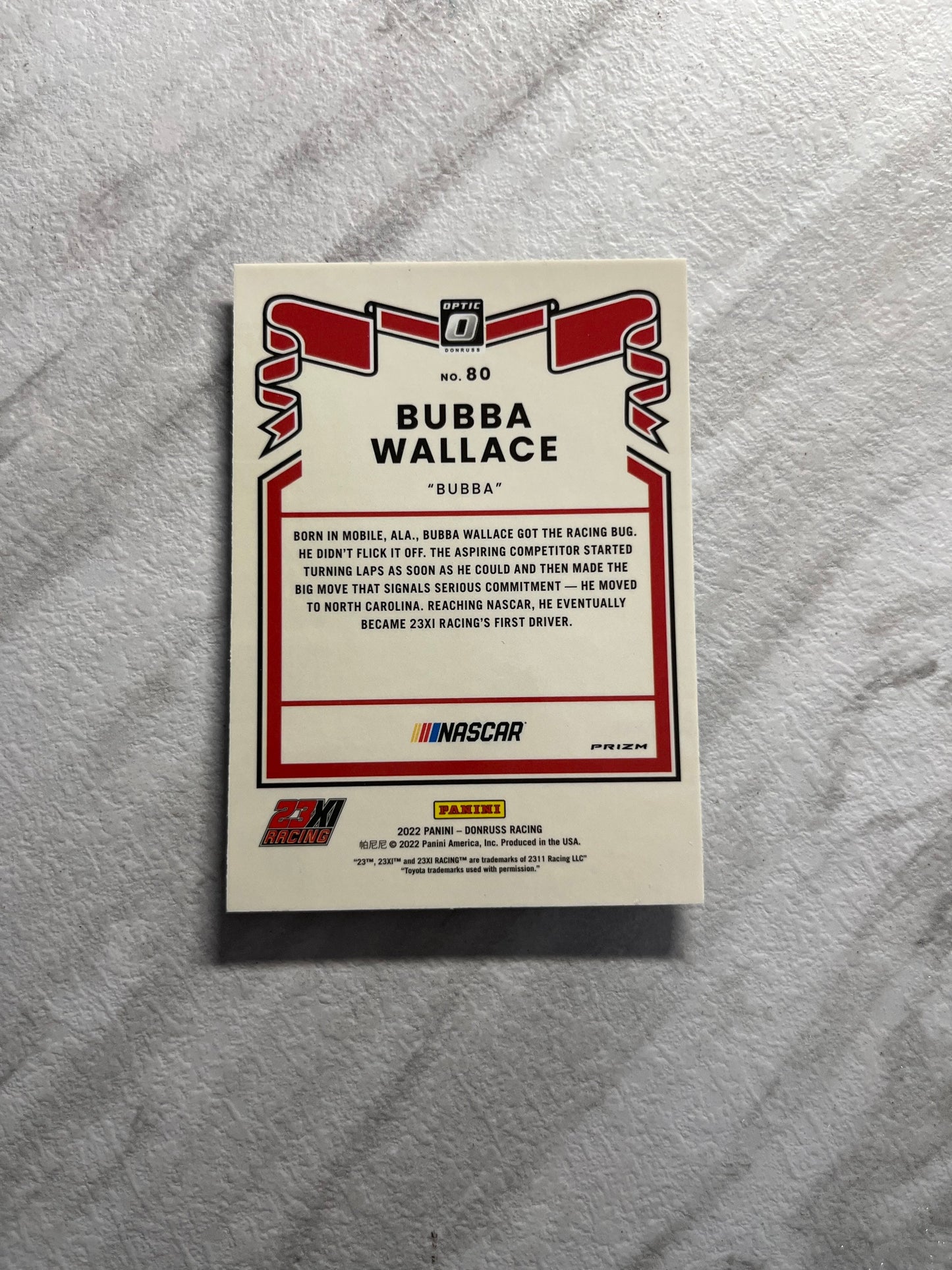 Bubba Wallace - 2022 Donruss Racing CAROLINA BLUE Optic Pulsar PRIZM 1981 Retro Variation card - short print